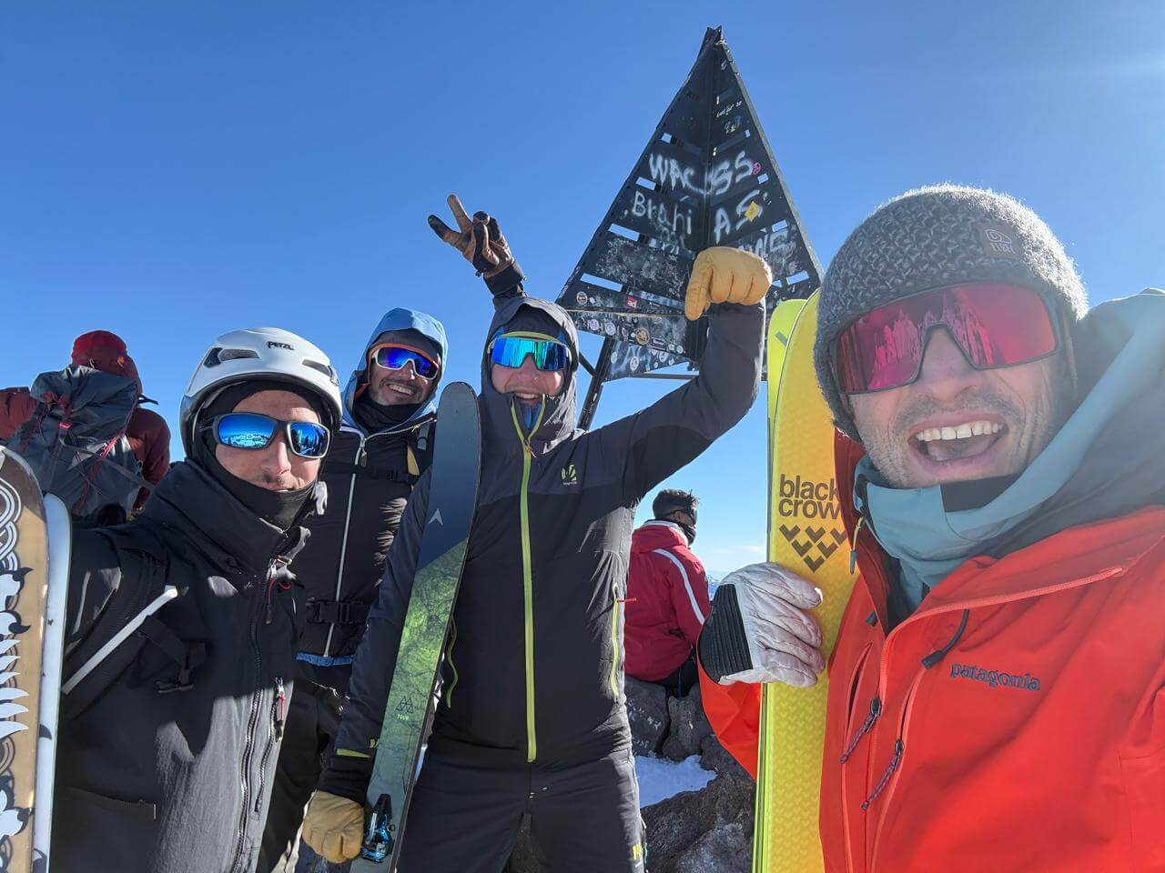 Ski touring group celebrating after a High Atlas mountain expedition