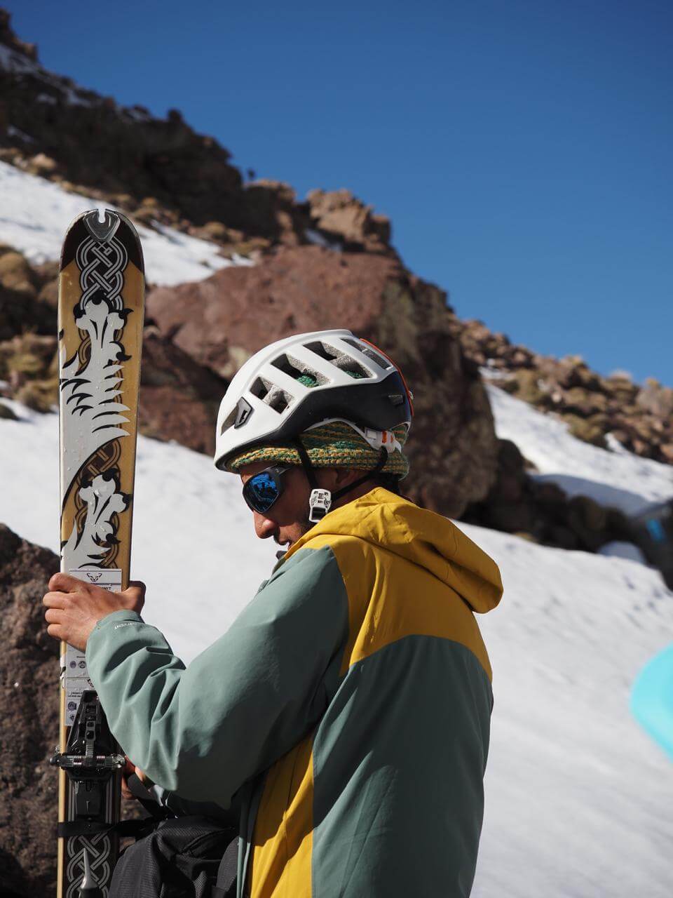 Radouane preparing skis for a ski touring day in Morocco