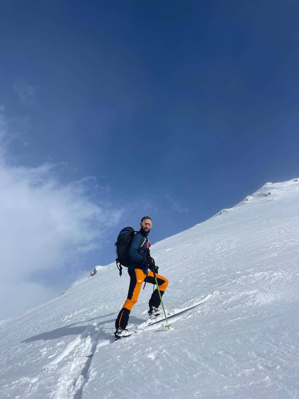 Ski touring through high mountain terrain on a M'Goun expedition in Morocco