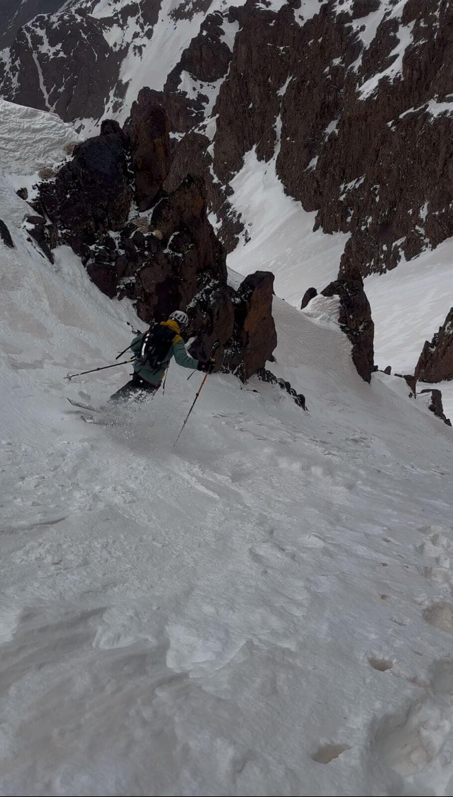 Ski descent in a Tazaghart couloir in the High Atlas Mountains