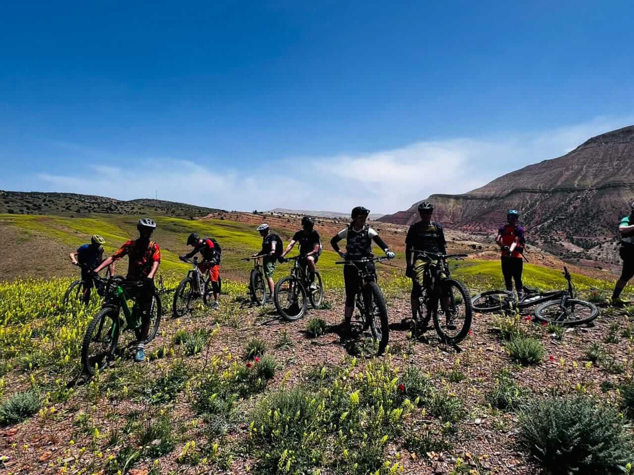 Mountain bikers riding through the Atlas Mountains of Morocco