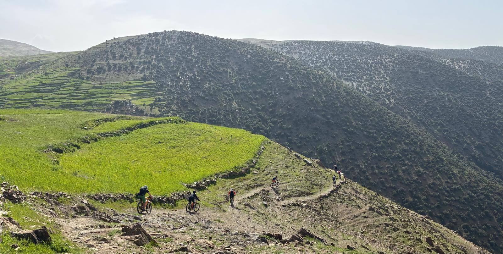 Mountain biker riding a trail in the High Atlas Mountains of Morocco