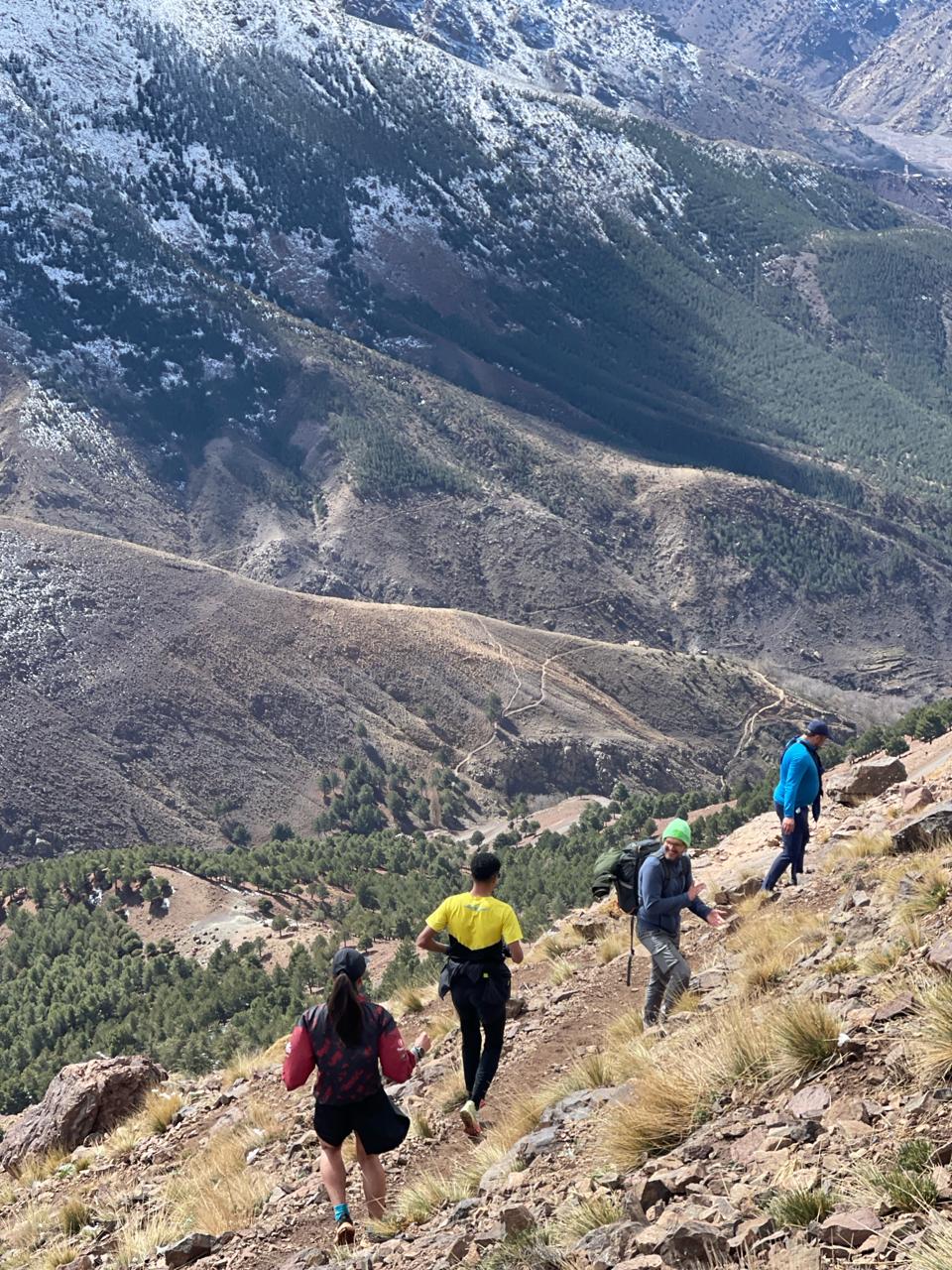 Toubkal Wawgant Trail — Imlil High Atlas Trail Running Experience Trail runners in the High Atlas Mountains near Imlil during the Toubkal Wawgant Trail experience in Morocco