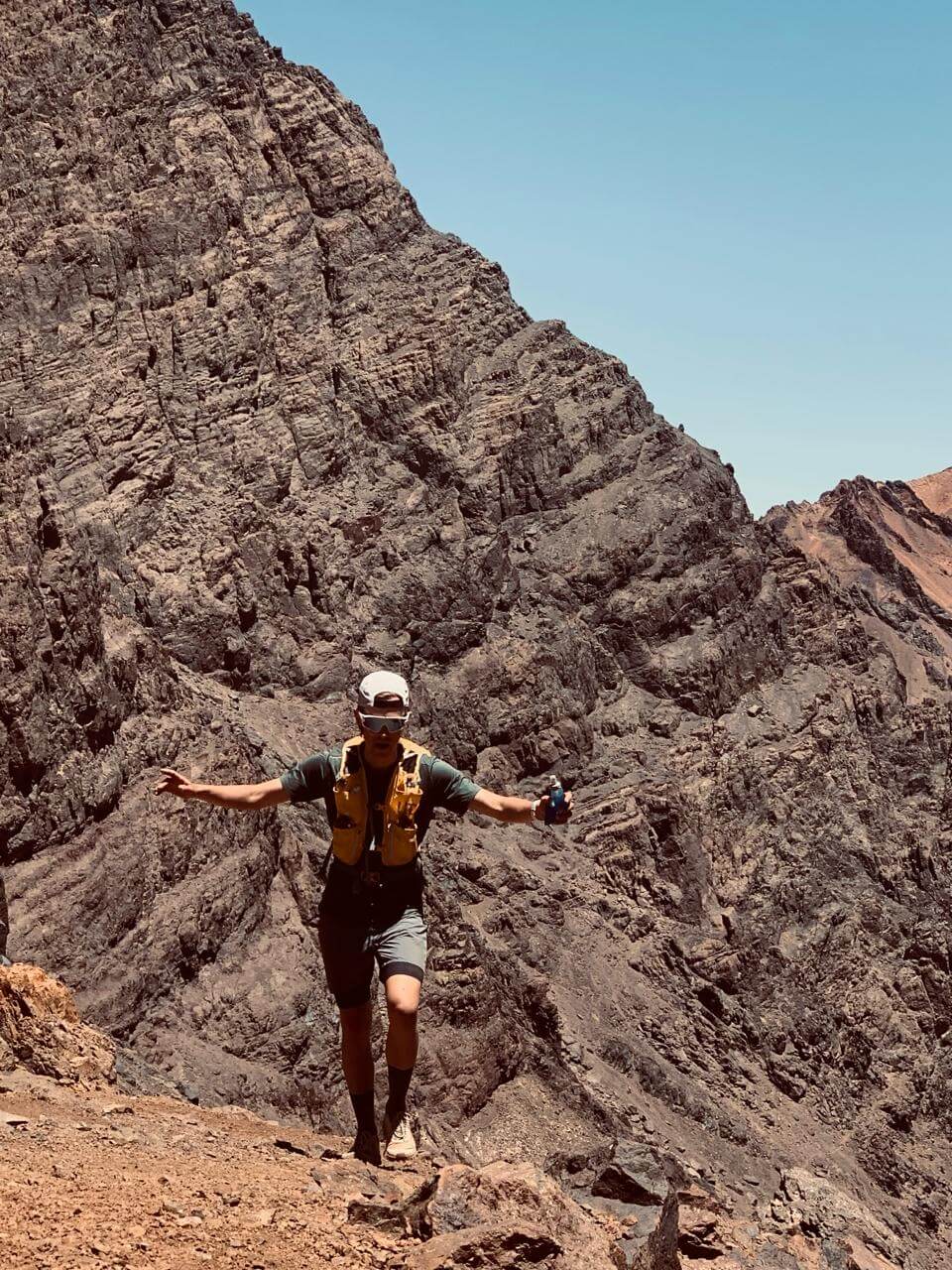 Radouane Outdoor guide at Tizi Ouanoums, a challenging high-altitude mountain pass in Morocco's High Atlas