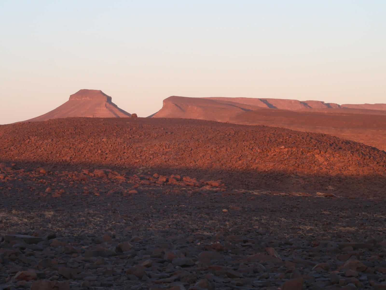 Remote desert plateau and campsite in southern Morocco