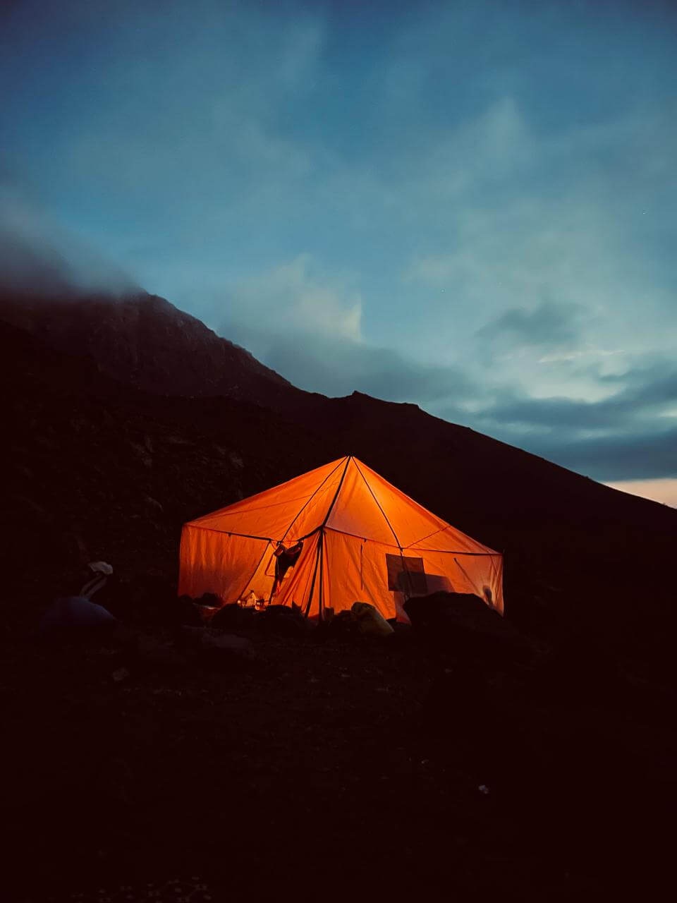 Summer camping beneath Mount Toubkal in the High Atlas Mountains of Morocco